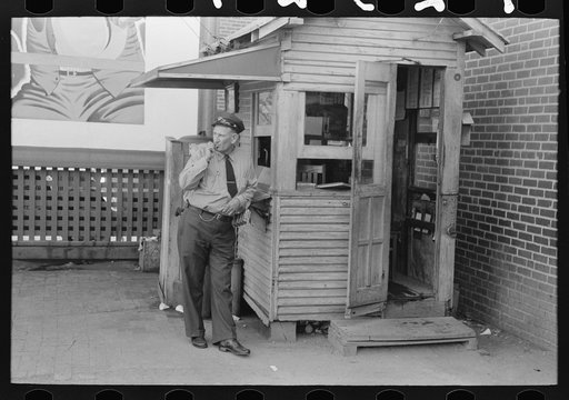 Streetcar motorman in front of station master's shack, streetcar and interurban station, Oklahoma City, Oklahoma