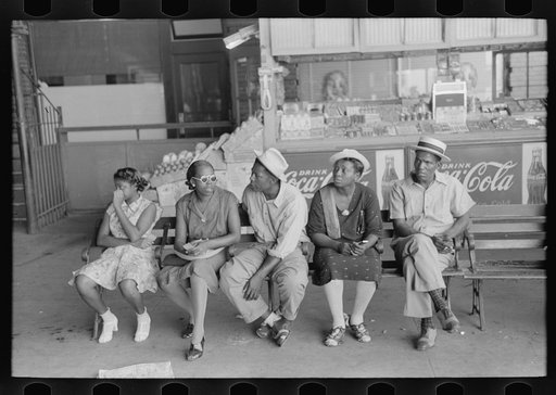 Negroes waiting for streetcar at terminal in Oklahoma City, Oklahoma