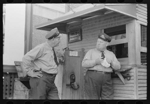 Streetcar operators talking in terminal, Oklahoma City, Oklahoma