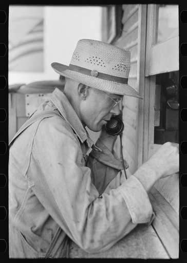 Streetcar employee reporting over telephone. Streetcar terminal, Oklahoma City, Oklahoma