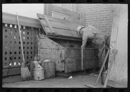 Oiler at locker. Streetcar terminal, Oklahoma City, Oklahoma