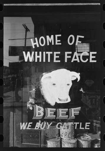 Sign on window of store, Muskogee, Oklahoma