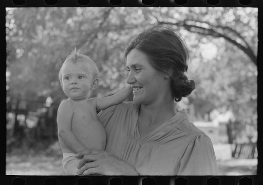 Wife of carpenter and her baby who live in community camp, Oklahoma City, Oklahoma