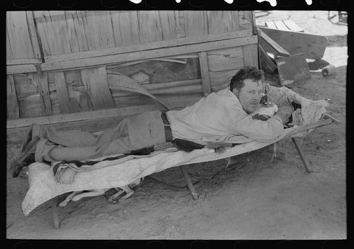 Partially-paralyzed man in May's Avenue camp, Oklahoma City, Oklahoma
