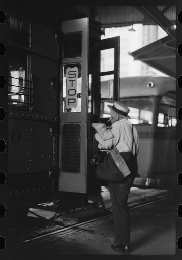 Untitled photo, possibly related to: People getting off and people waiting to get on streetcar. Terminal, Oklahoma City, Oklahoma