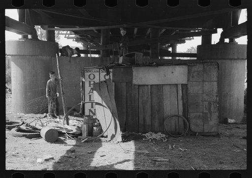 Children in May's Avenue camp playing under the bridge, Oklahoma City, Oklahoma