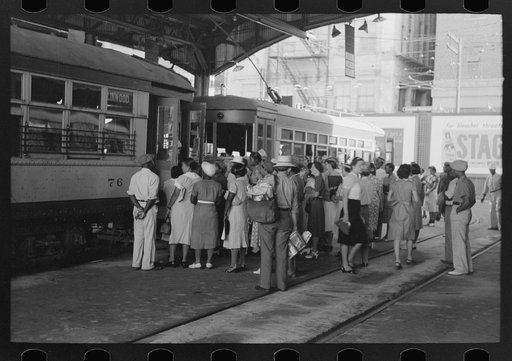 People getting off and people waiting to get on streetcar. Terminal, Oklahoma City, Oklahoma