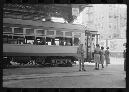 Untitled photo, possibly related to: People getting off and people waiting to get on streetcar. Terminal, Oklahoma City, Oklahoma