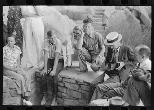 Tourists at cliff dwellings in Mesa Verde National Park, Colorado
