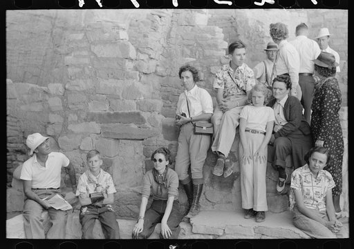 Tourists at cliff dwellings in Mesa Verde National Park, Colorado