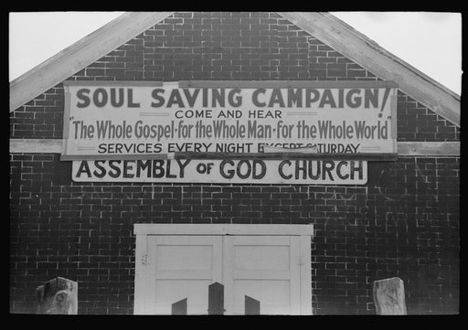 Sign on Assembly of God church, Pleasanton, New Mexico