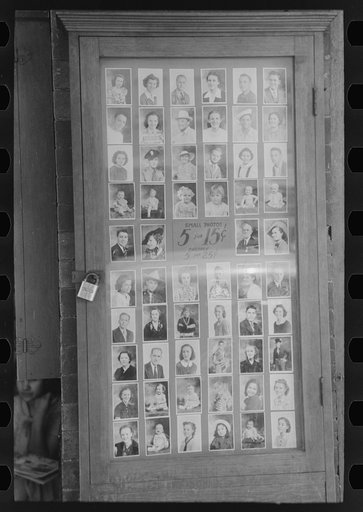 Albuquerque, New Mexico. Photo display in front of a photographer's studio