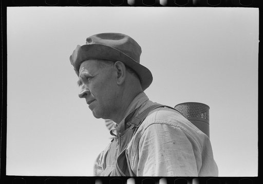 Untitled photo, possibly related to: Mr. Germeroth, Farm Security Administration client sitting on tractor which was bought by means of FSA loan, Sheridan County, Kansas
