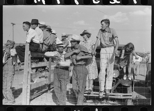 Spectators at 4-H Club fair at Cimarron, Kansas. The 4-H Club fairs have taken the place of the defunct county fairs in Kansas