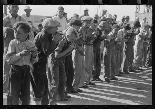 Untitled photo, possibly related to: End of the pie eating contest. Winner had hand raised. 4-H Club fair, Cimarron, Kansas