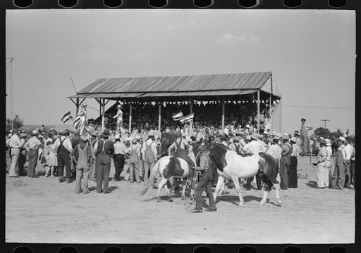 Untitled photo, possibly related to: Parade of the champions by 4-H Club members at 4-H Club fair, Cimarron, Kansas