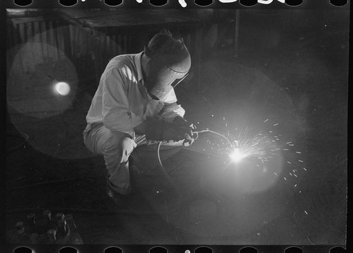 Electric welding, an essential part of oil field activities, Seminole, Oklahoma