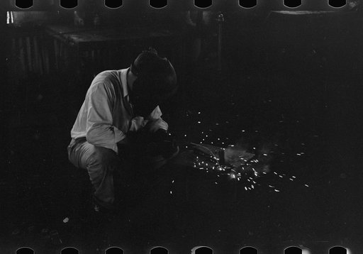 Untitled photo, possibly related to: Electric welding, an essential part of oil field activities, Seminole, Oklahoma