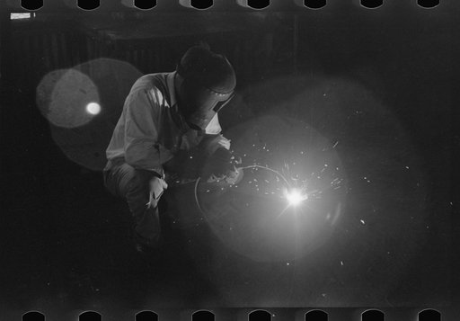 Untitled photo, possibly related to: Electric welding, an essential part of oil field activities, Seminole, Oklahoma