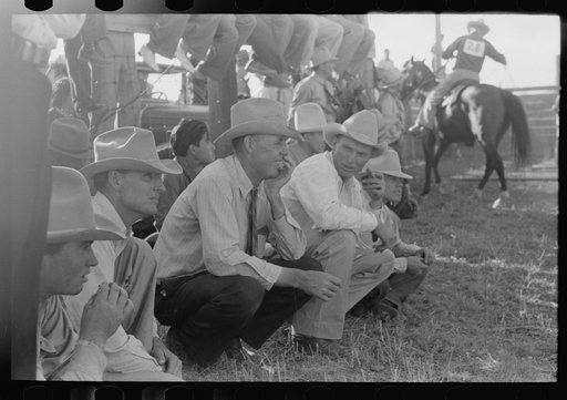 Spectators at Bean Day rodeo, Wagon Mound, New Mexico
