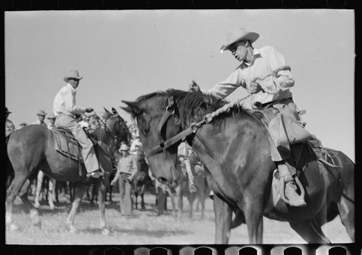 Untitled photo, possibly related to: Spectators at Bean Day rodeo, Wagon Mound, New Mexico