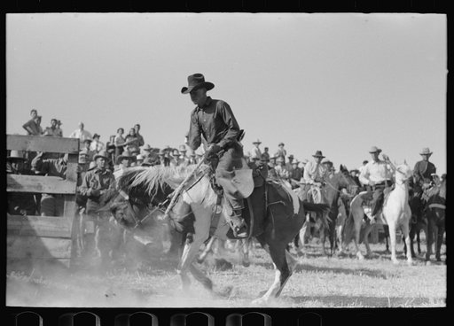 Untitled photo, possibly related to: Cowboy at Bean Day rodeo, Wagon Mound, New Mexico
