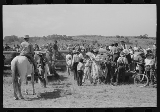 Untitled photo, possibly related to: Spectators at Bean Day rodeo, Wagon Mound, New Mexico