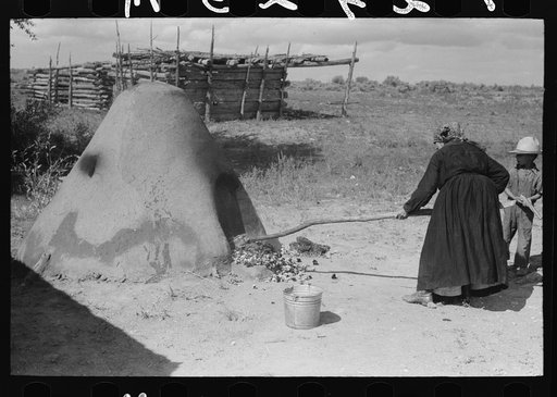 Untitled photo, possibly related to: Pulling out hot coals with wet cloth, Taos County, New Mexico