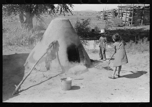 Untitled photo, possibly related to: Pulling out hot coals with wet cloth, Taos County, New Mexico