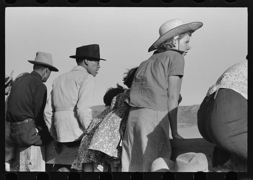 Spectators at Bean Day rodeo, Wagon Mound, New Mexico
