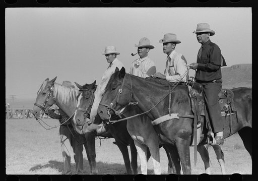 Judges at Bean Day rodeo, Wagon Mound, New Mexico