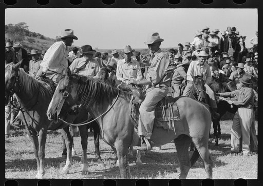 Untitled photo, possibly related to: Cowboys talking, Bean Day rodeo, Wagon Mound, New Mexico