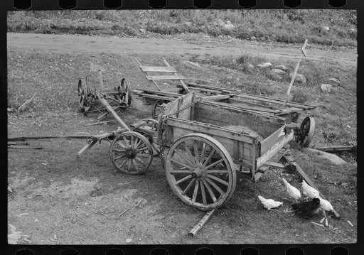 Wagon and agricultural equipmenmt on farm near Bradford, Vermont