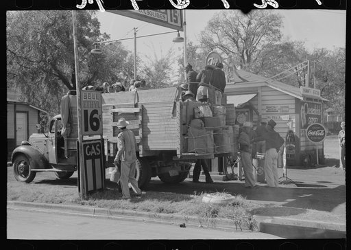 Truckload of Mexican migrants returning from Mississippi where they had been picking cotton. Highway near Neches, Texas, Anderson County