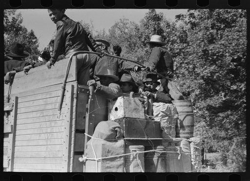 Untitled photo, possibly related to: Truckload of Mexican migrants returning from Mississippi where they had been picking cotton. Highway near Neches, Texas, Anderson County