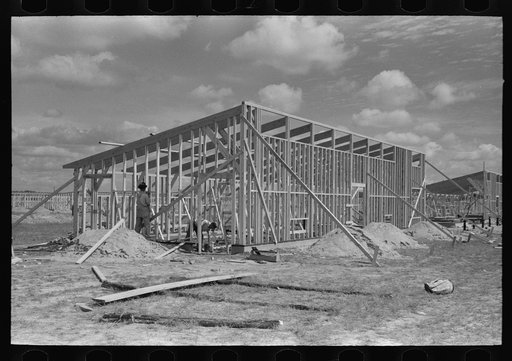 Untitled photo, possibly related to: Erecting framework of a unit of the migrant camp at Sinton, Texas
