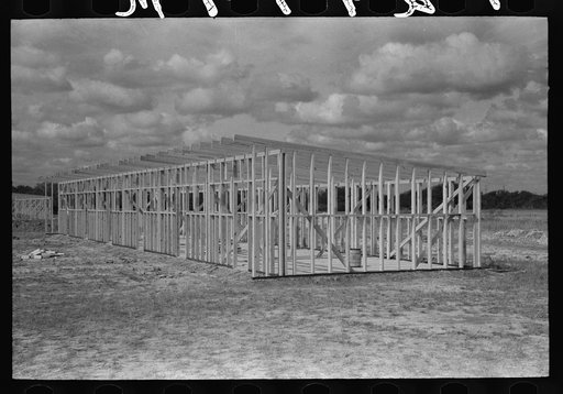 Untitled photo, possibly related to: Erecting framework of a unit of the migrant camp at Sinton, Texas