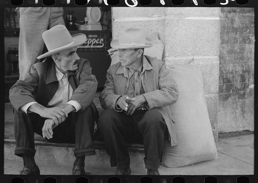 Untitled photo, possibly related to: Mexican farmers talking in town, Taylor, Texas