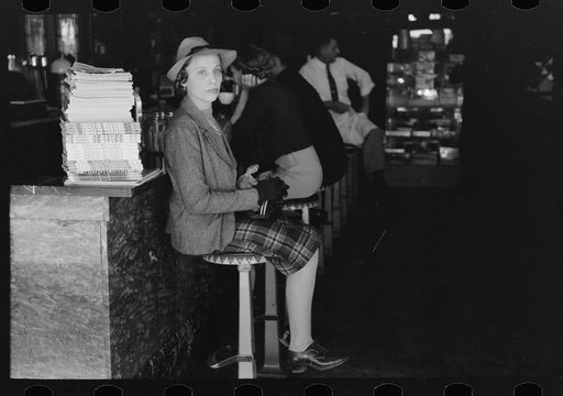Untitled photo, possibly related to: Woman sitting at soda fountain, Taylor, Texas