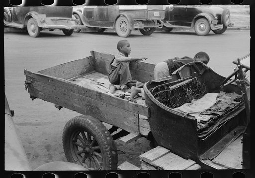 Untitled photo, possibly related to: Sign and battery on Negro's truck, Waco, Texas