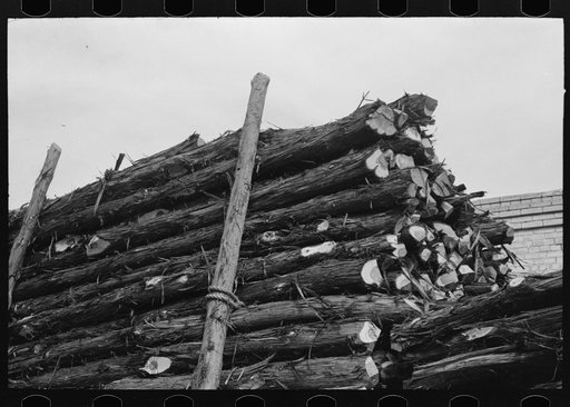 Untitled photo, possibly related to: Truckloads of fence posts en route for Oklahoma. Clifton, Texas