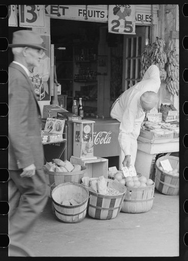 Untitled photo, possibly related to: Proprietor of small store in market square, Waco, Texas