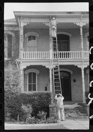 Painting a house, Waco, Texas