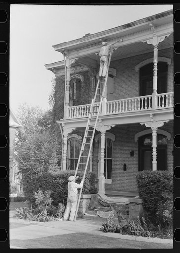 Painting a house, Waco, Texas