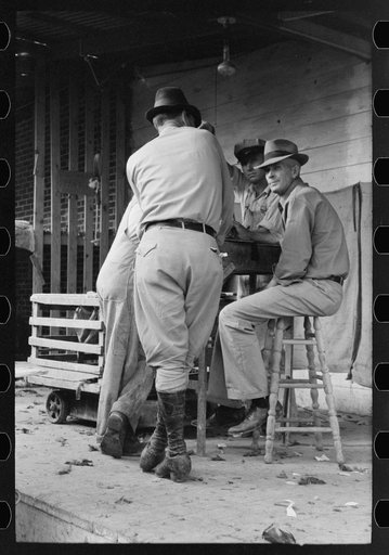 Untitled photo, possibly related to: Weigher at poultry cooperative, Brownwood, Texas