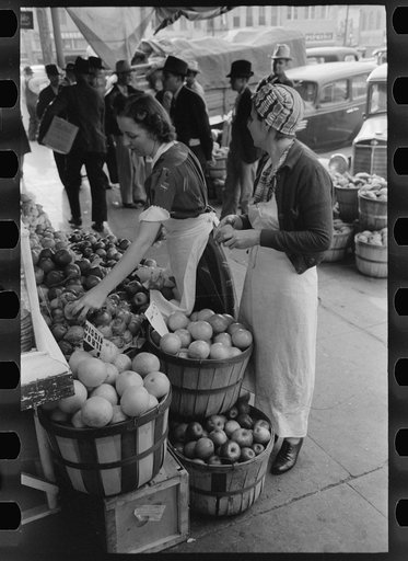 Untitled photo, possibly related to: Saleswoman at grocery store, Waco, Texas