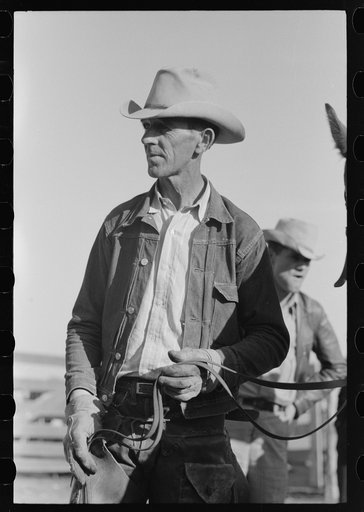 Cattlemen at stockyard, San Angelo, Texas