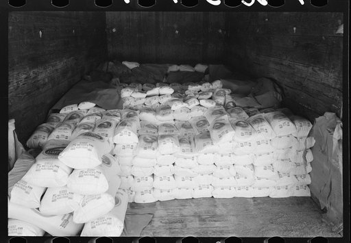Untitled photo, possibly related to: Flour in railroad freight car at wholesale grocers, San Angelo, Texas