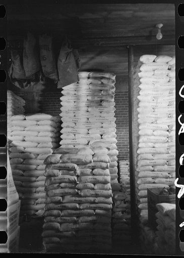 Untitled photo, possibly related to: Flour in railroad freight car at wholesale grocers, San Angelo, Texas