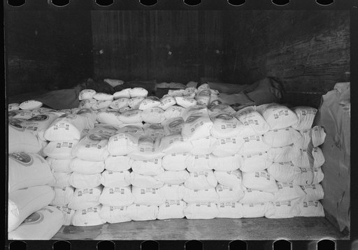 Untitled photo, possibly related to: Flour in railroad freight car at wholesale grocers, San Angelo, Texas